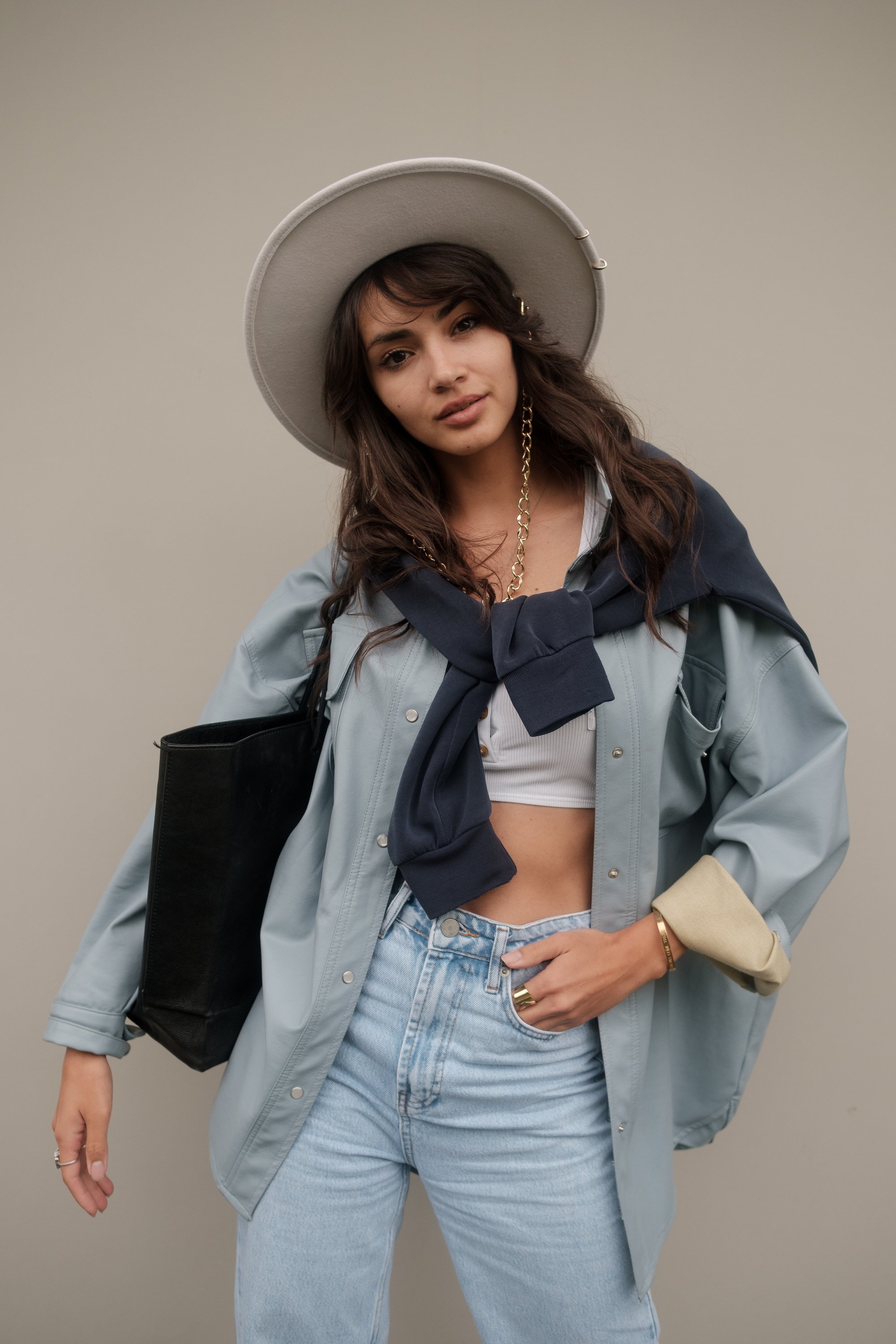 Pretty Girl in Hat and Trendy Clothes 